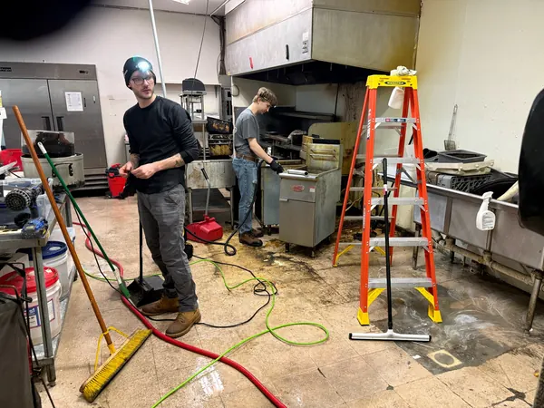 SaniDine crew working in a commercial kitchen