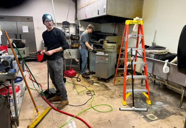 SaniDine crew working in a commercial kitchen