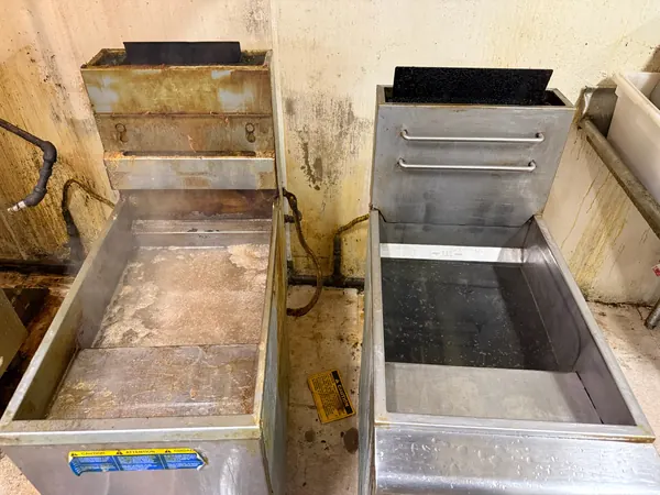 Cooking equipment at different stages of cleaning