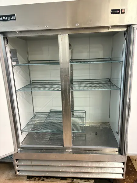 Empty commercial refrigerator interior