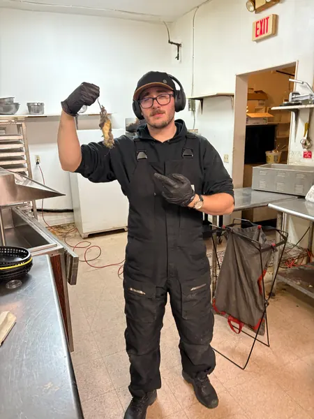 SaniDine crew member on a kitchen cleaning job