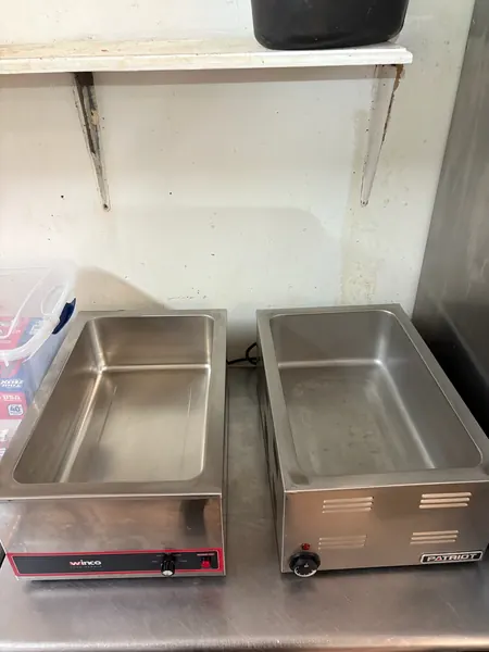 Stainless cooking equipment after detailing